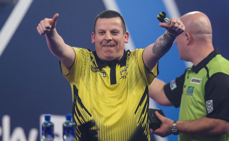 World No1 Michael van Gerwen (right) crashed out of the World Darts Championship after a shock 5-0 defeat to Dave Chisnall