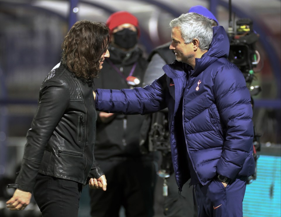 Gareth Ainsworth greets Jose Mourinho pitchside before the game got underway