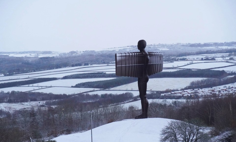 The Angle of the North looking out over a snow-covered landscape