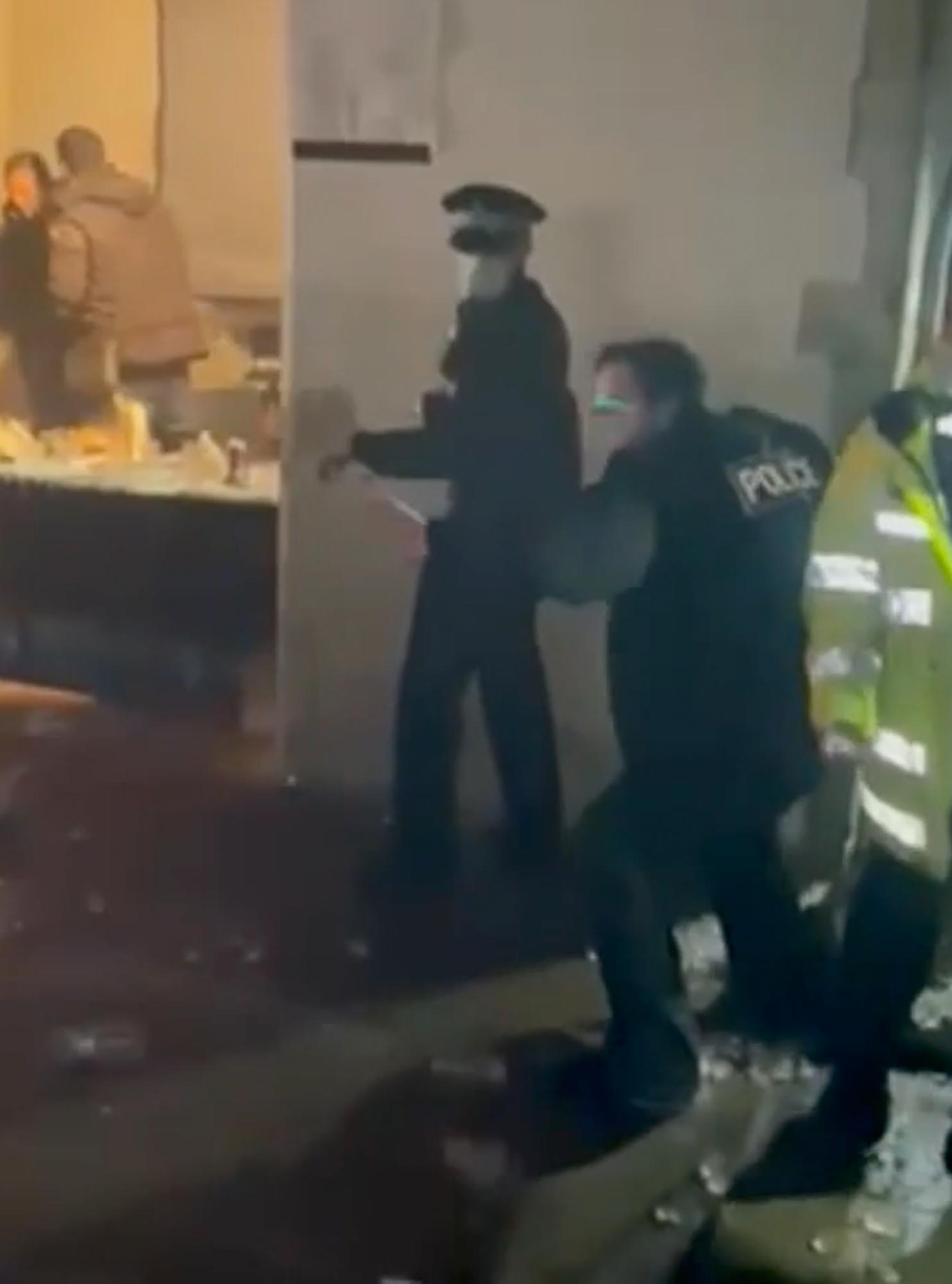 Cops were pelted with bottles as they shut down a rave