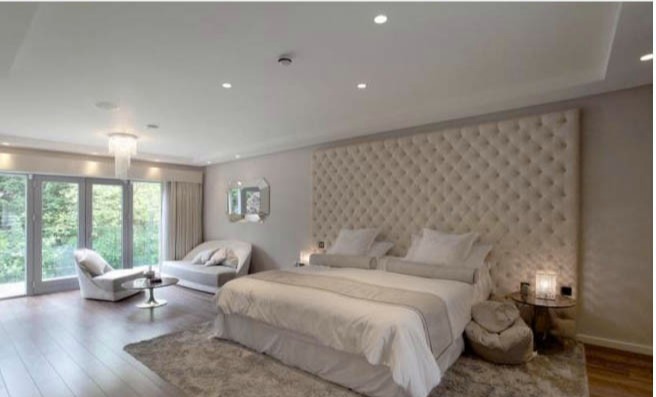 A snap of the master bedroom shows it boasts plenty of space