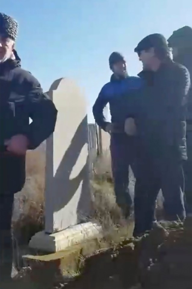 Mourners at the 'funeral' of the two newborns - who never existed in the first place