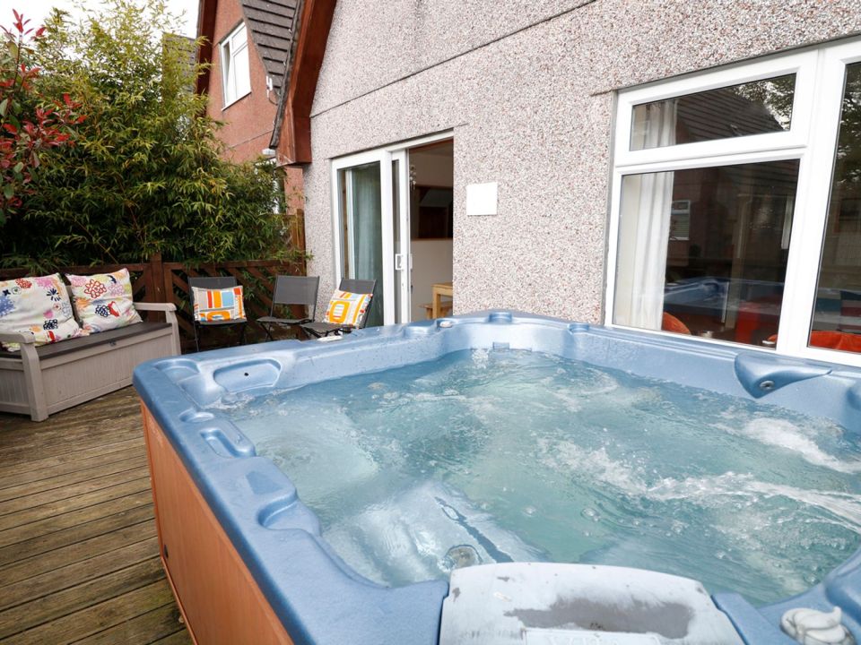 There's a private hot tub and a barbecue