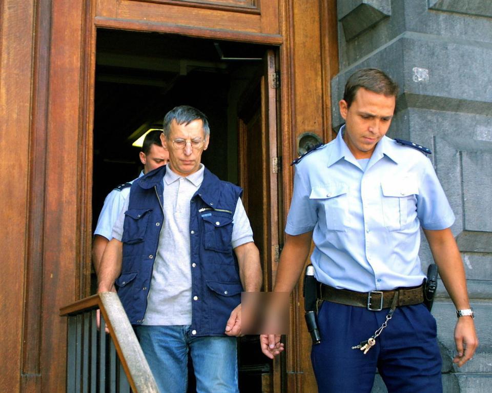 Fourniret leaving a Belgian court after his arrest in 2003