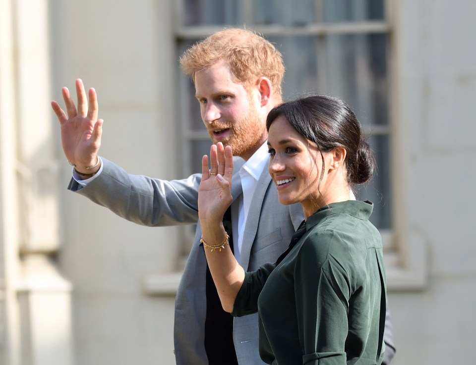 Meghan and Harry pictured during a royal visit to Brighton back in 2018