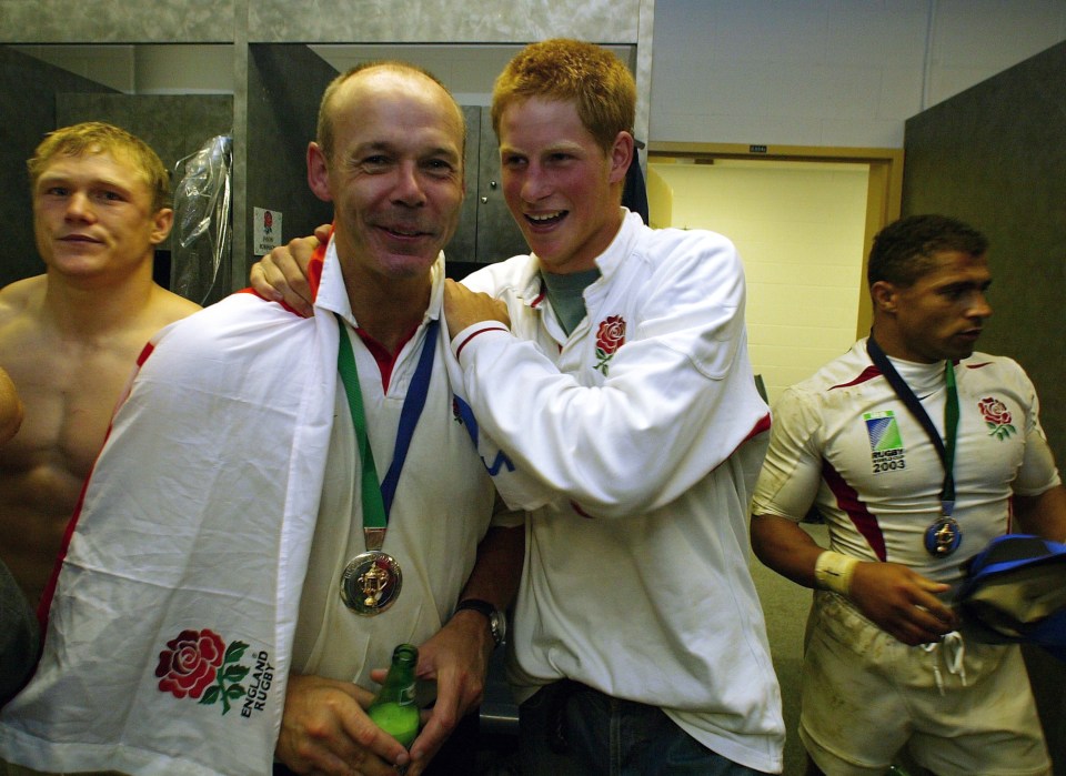 Prince Harry, a keen rugby fan, is pictured celebrating with Sir Clive Woodward after England's 2003 World Cup win