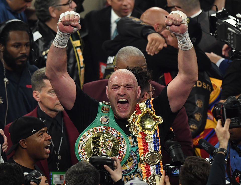 Tyson Fury celebrates dethroning Deontay Wilder last February