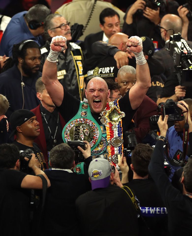 Tyson Fury celebrates his stunning victory over Deontay Wilder last February