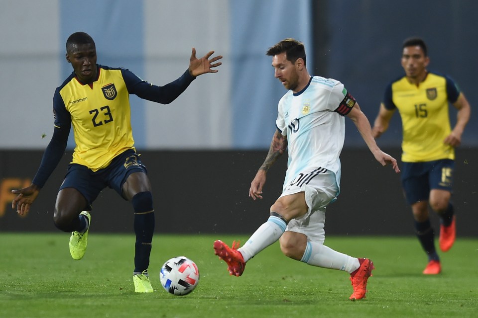 Lionel Messi is closed down by the energetic Caicedo in a World Cup qualifier