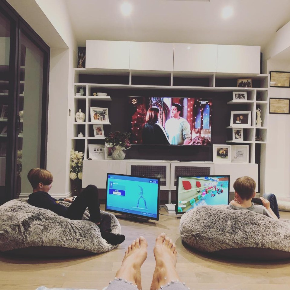 While Stacey watches TV, Zachary, 12 and Leighton, eight, get to play video games together but on their own screen to avoid fall-outs