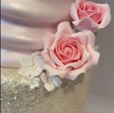 The cake had some beautiful intricate details around the edges