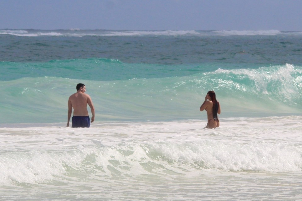 Jonathan and Lourdes played in the waves