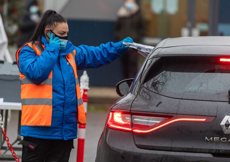 A driver gets a Covid test at a facility in Pollards Hill, Mitcham, South London