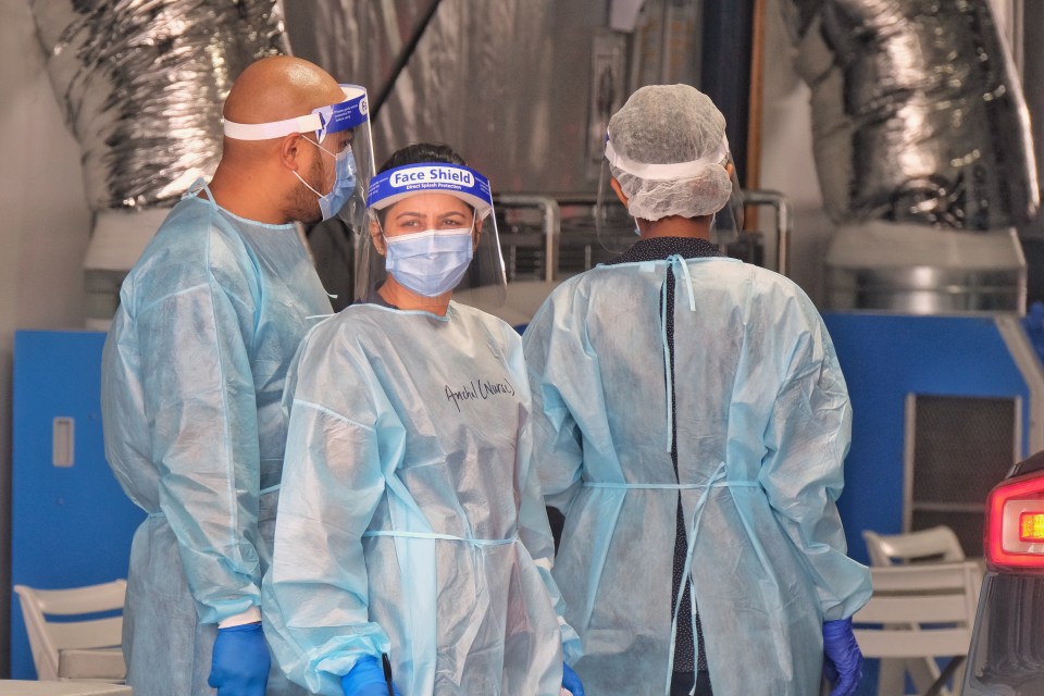 Medical staff work at a Covid-19 pop-up testing centre in Dandenong, Melbourne