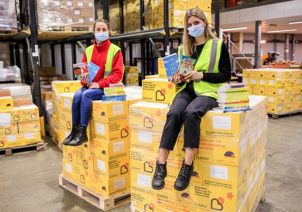 Justina Trapikaite and Simona Bacelyte pose with some of the wonderful books going to kids across the nation