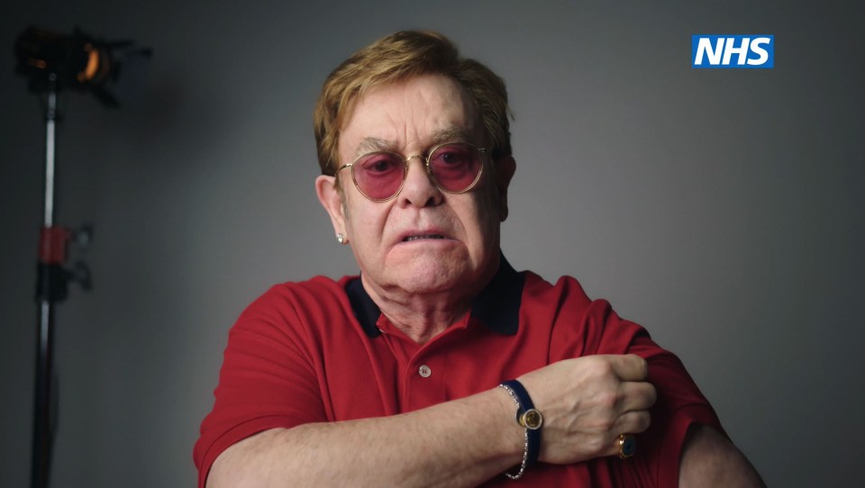 Elton John recorded a 90-second film at Chelsea and Westminster Hospital, in London, to promote the Covid jab