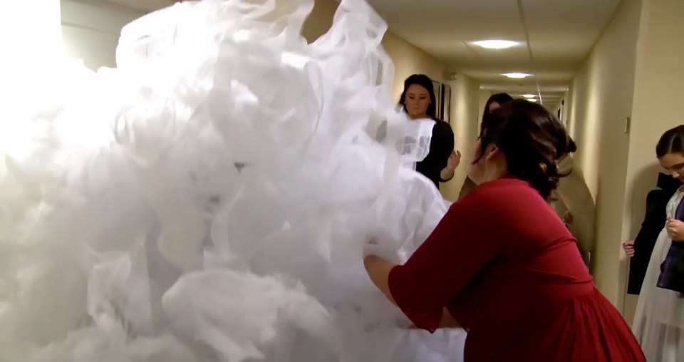 The huge dress is made up of over 200ft of organza silk