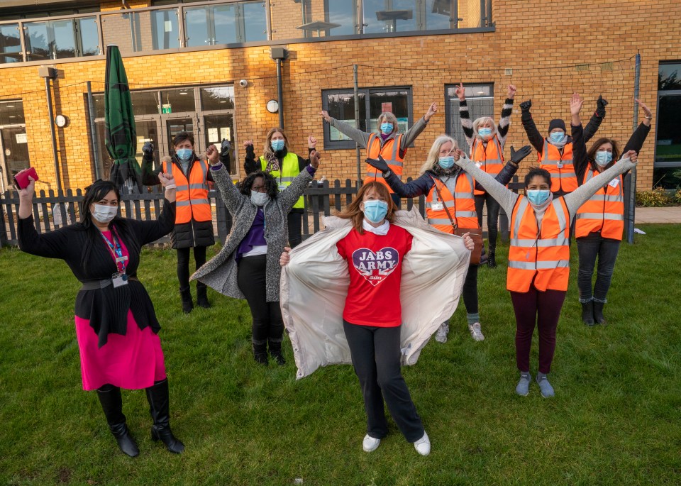 Sky News host Kay Burley with other volunteers and staff ensuring everyone gets their jab