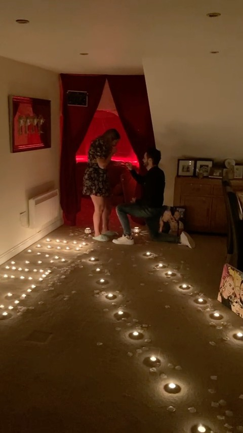 Matt got down on one knee in his living area space