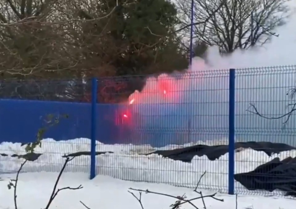 Ipswich fans lit flares that ended up causing a fire at the club's training ground