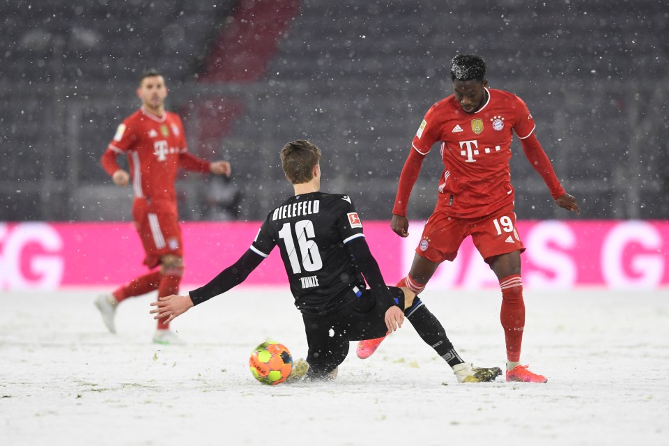 Alphonso Davies in action during Bayern's snowy 3-3 draw with Arminia