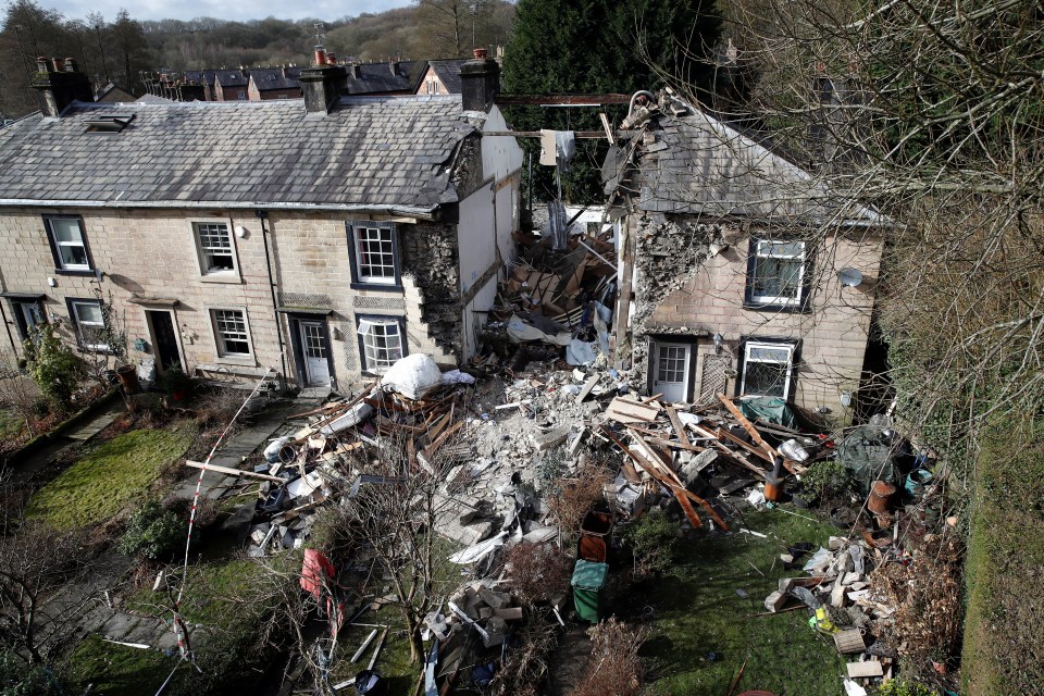 An aerial photograph shows the damage to the home