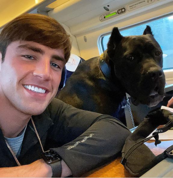 Love Island's Jack Fincham posed for a photo with his dog Elvis who has cropped ears