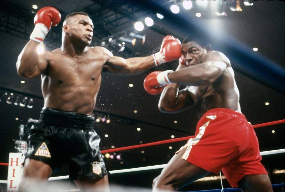 Mike Tyson weathered Bruno's first round storm and roared back to stop the brave Brit with a trademark attack