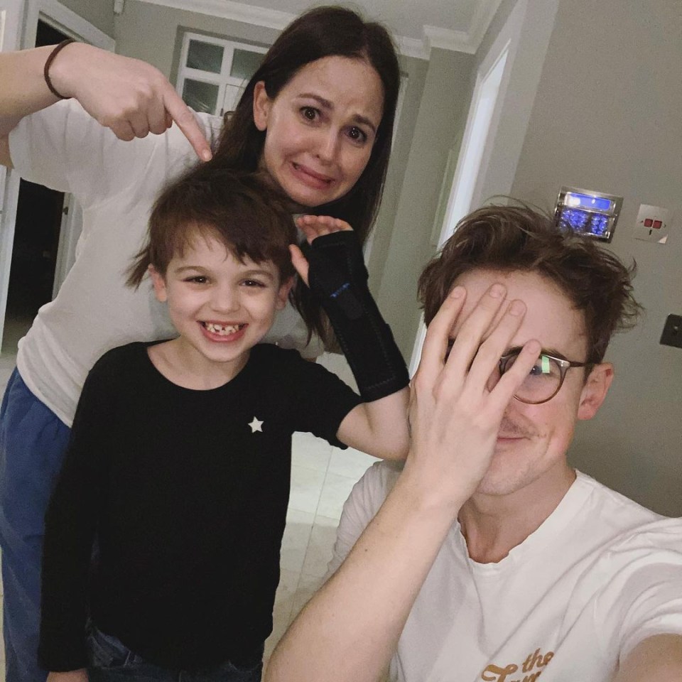 Giovanna and Tom Fletcher with their son Buzz, six, who fractured his wrist after falling off his bike