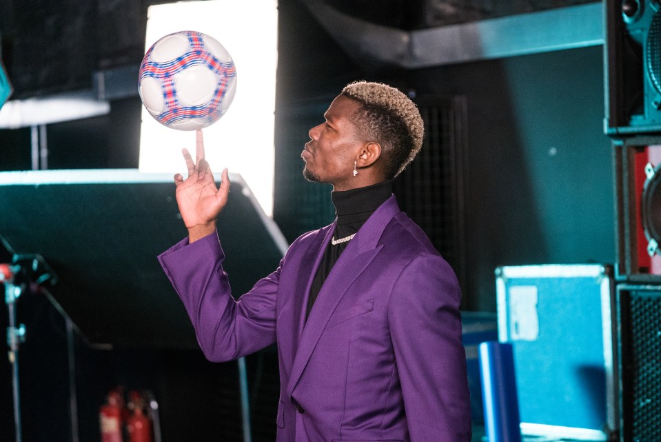 French World Cup winner Pogba spins a football on his finger