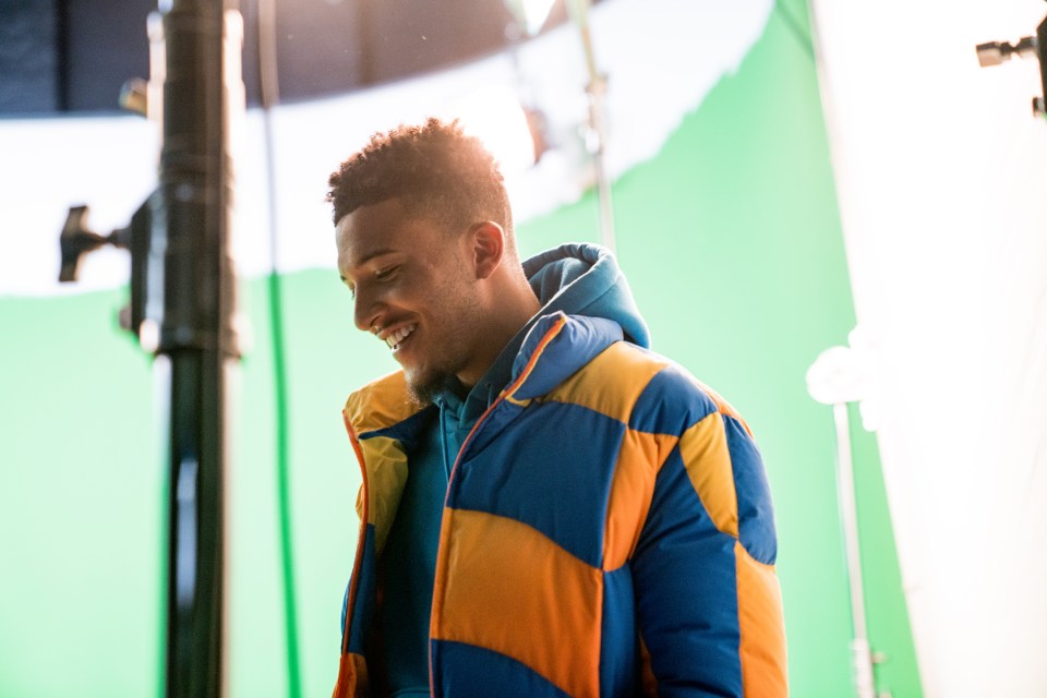 Borussia Dortmund ace Sancho cracks a smile while filming