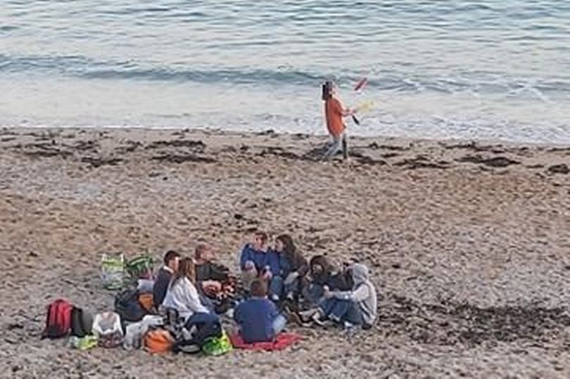 Groups of friends were seen drinking and eating together on Gyllyngvase Beach in Falmouth