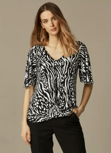 If you're a fan of animal print, there is 71% off this zebra blouse