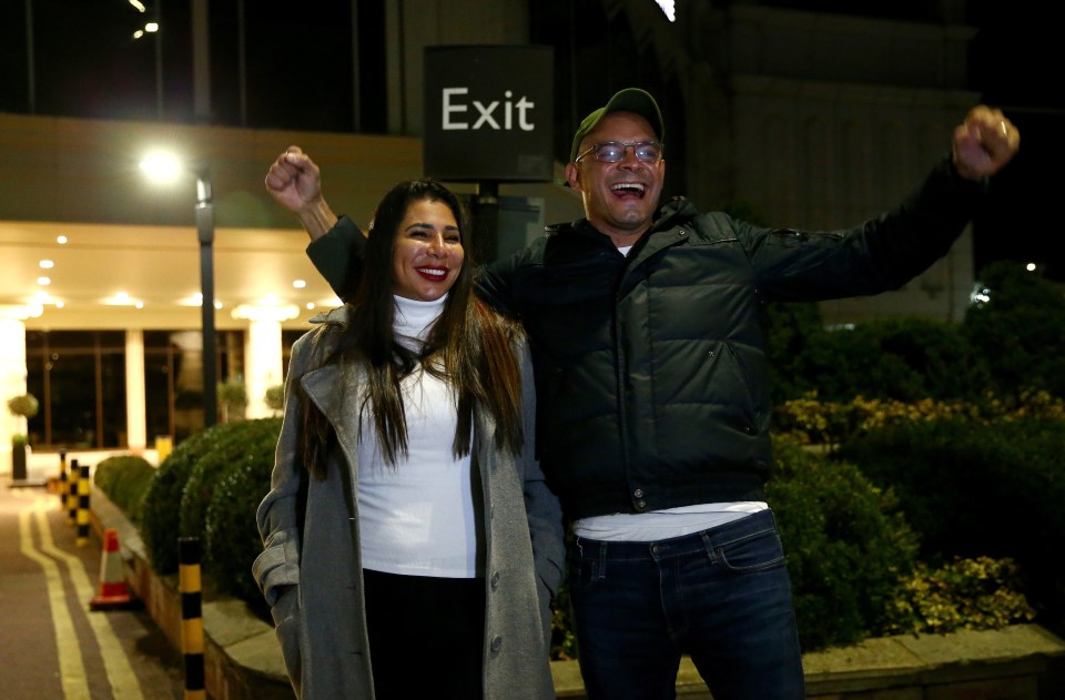 The couple pose for the press as they leave the Radisson Blu hotel