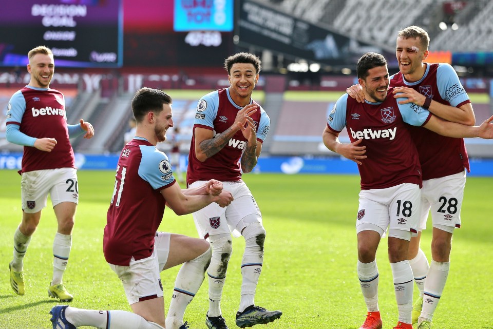 Jesse Lingard celebrates with his team-mates after netting in West Ham's win