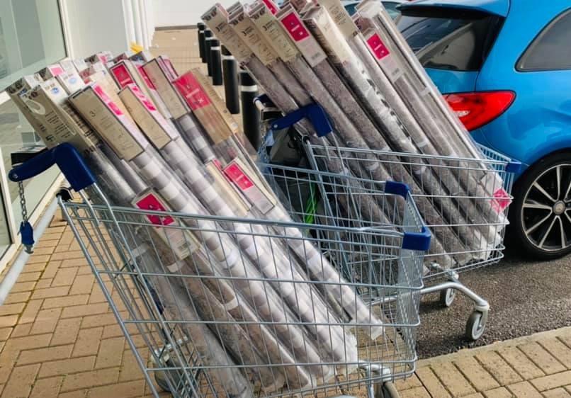 The B&M shopper walked out which two trolleys packed full of roller blinds she'd nabbed for £1