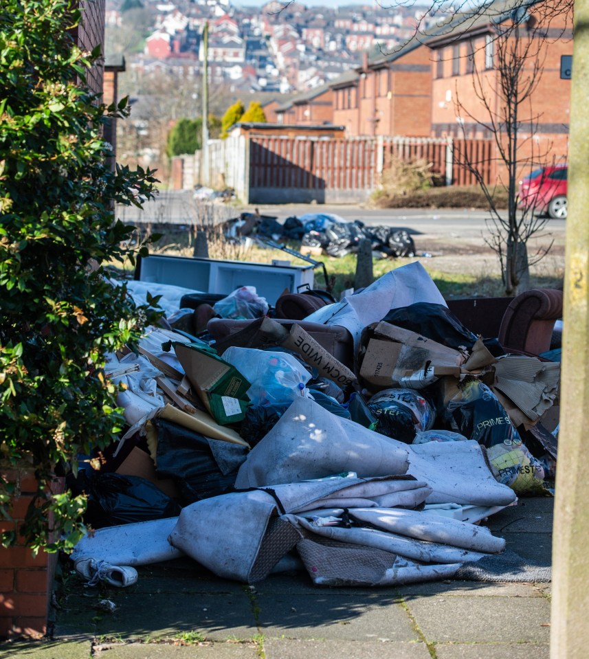 Skips are overflowing with filthy rubbish and countless bin bags have been dumped across the streets in the Griffin area of Blackburn