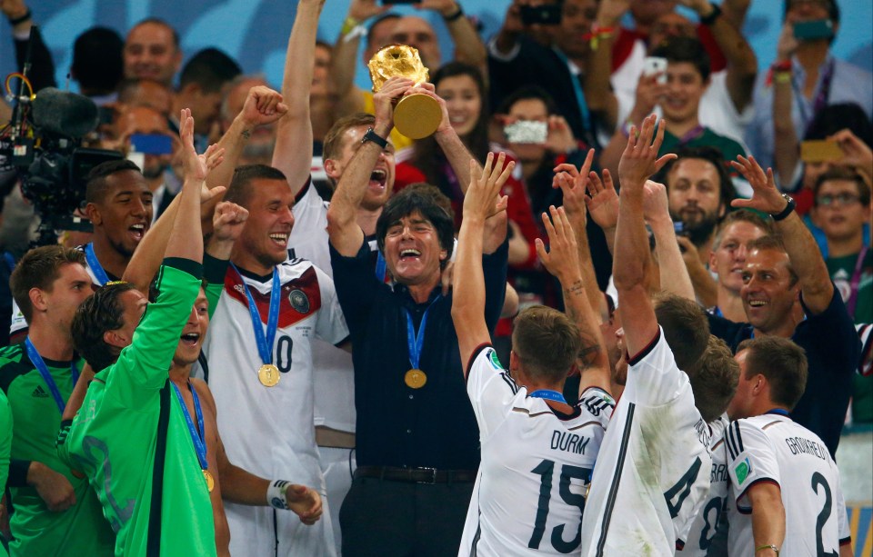 Joachim Low lifting the World Cup in 2014