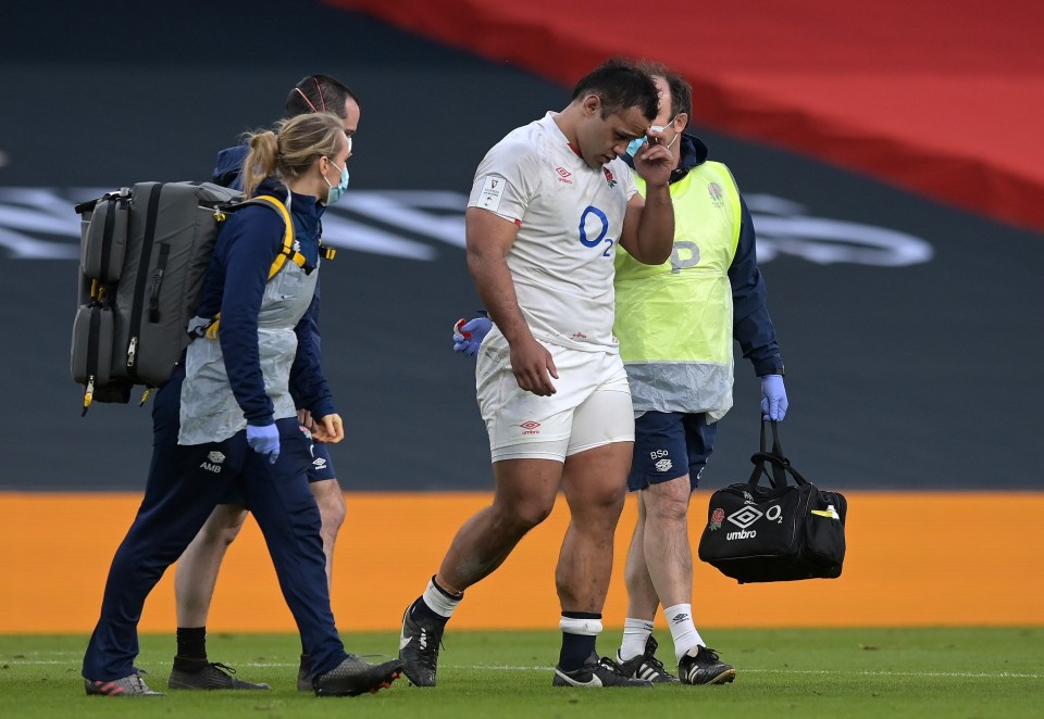 Billy Vunipola is lead away for an HIA after Bundee Aki's red-card tackle