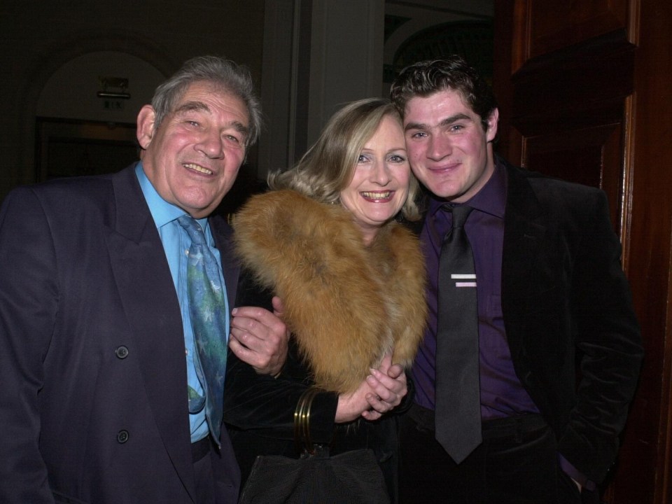 Peacock pictured with his wife Tilly and their son