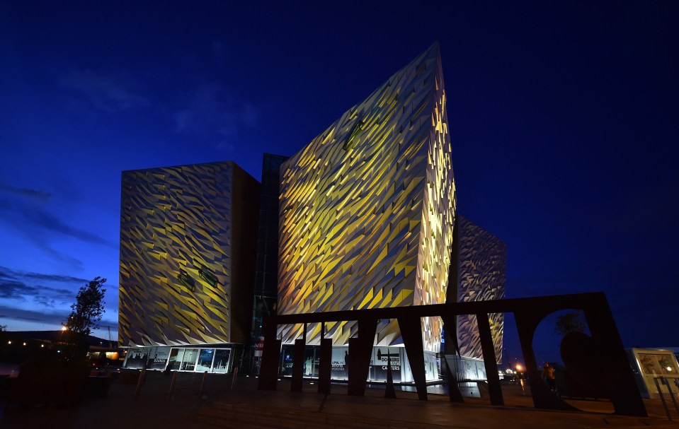 The iconic Titanic building and visitor centre was lit up in yellow for the Day of Reflection