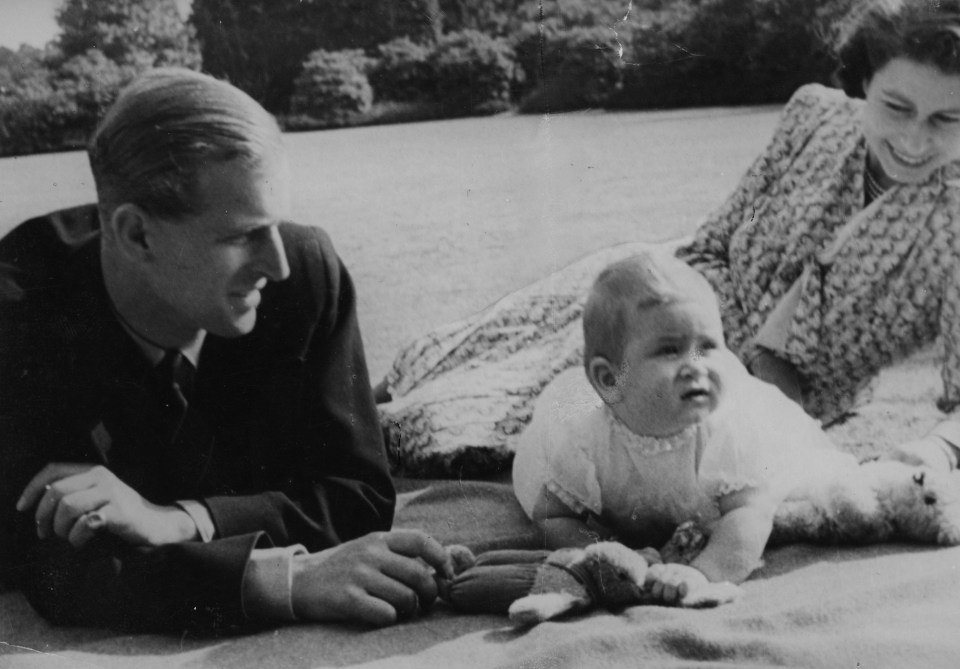 He and the Queen had four children together, pictured here with baby Charles in 1949