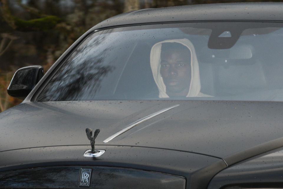 Man Utd's Paul Pogba leaves the club's Carrington Training complex in a Rolls Royce