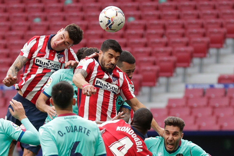 Chelsea are eyeing a move for Atletico Madrid defender Jose Gimenez, pictured left along with Luis Suarez