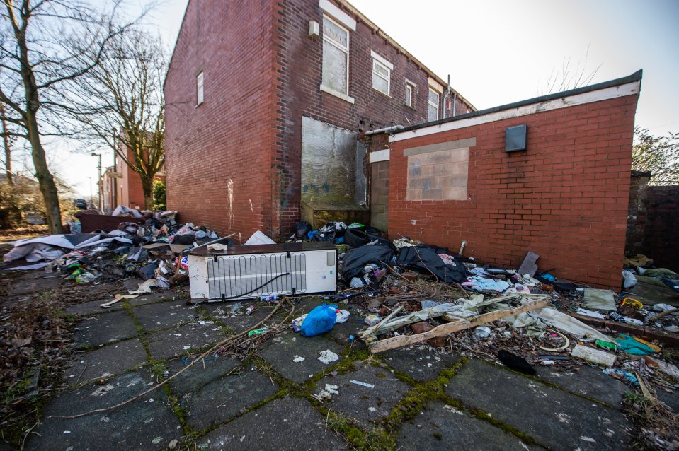 Shocking pictures show household rubbish, medication bottles, furniture and needles strewn around