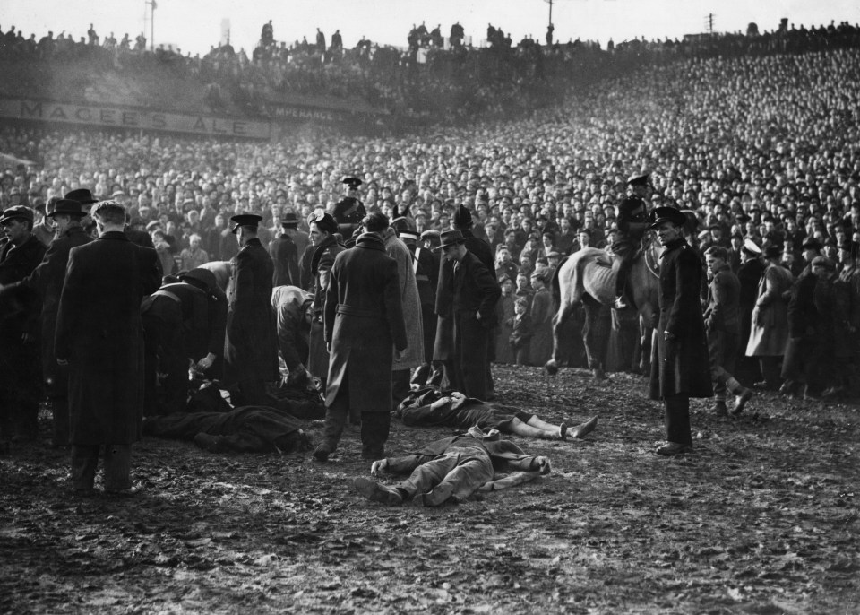 Police and fans on the Burnden Park pitch following the crush on March 9, 1946