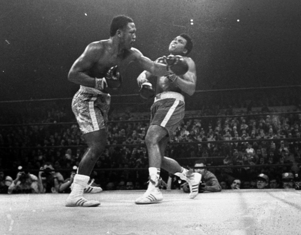 Joe Frazier eventually kept his unbeaten record with a final round stoppage win