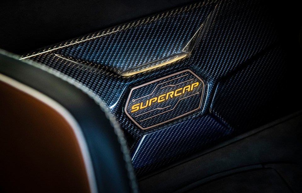 The glow-up ‘supercap’ badge between the seats