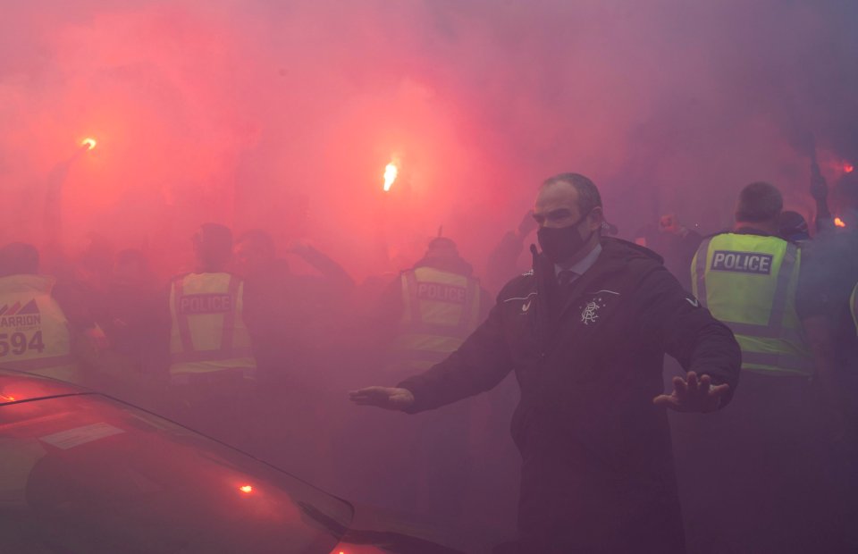 Rangers fans gather at Ibrox ahead of today's game against St Mirren with smoke bombs and flares