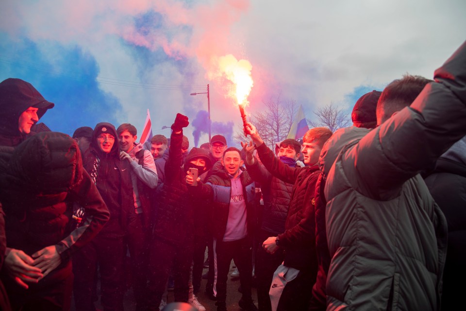 Rangers fans gathered outside Ibrox hours before the game to set of flares and smoke bombs